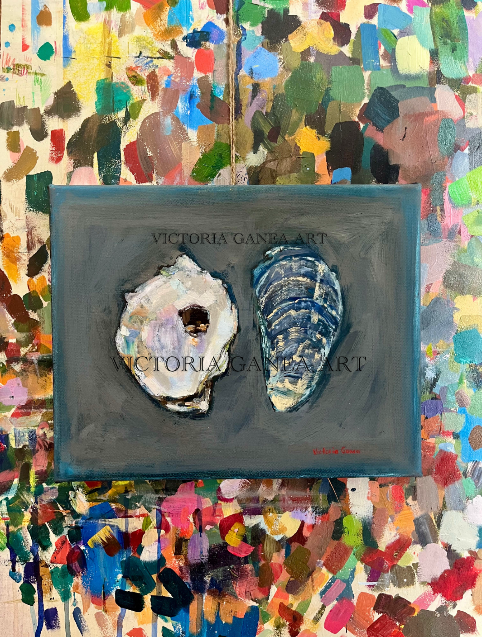 Two oyster shells in a blue
