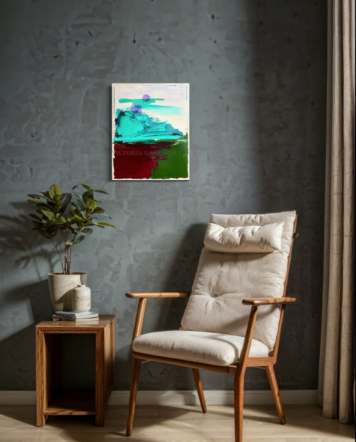 Beige armchair next to a wooden side table with a plant, against a gray wall with a colorful abstract painting.