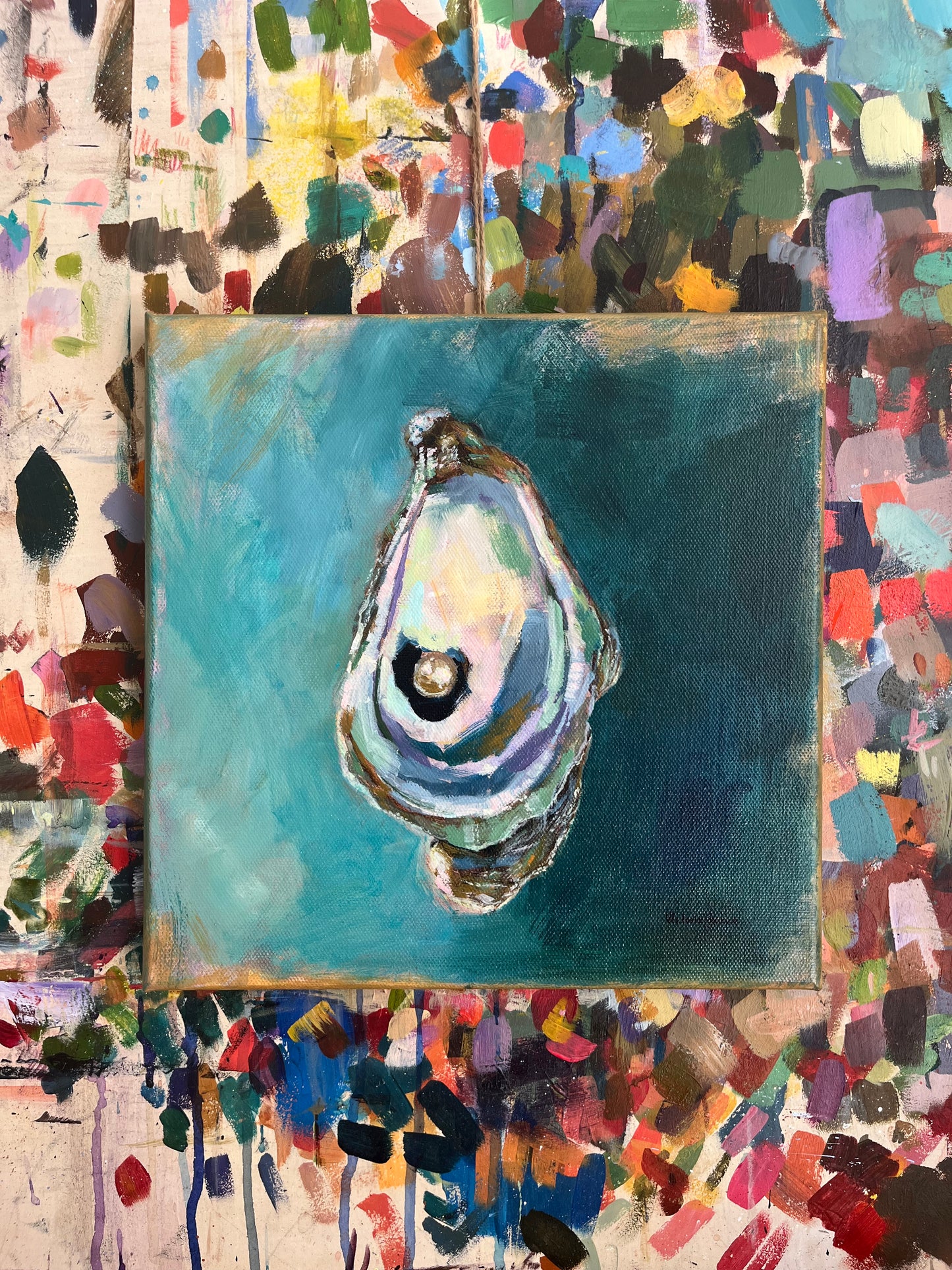 Painting of an oyster shell with a pearl on a textured multicolored background